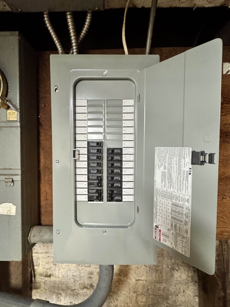 Electrical breaker panel with its door open