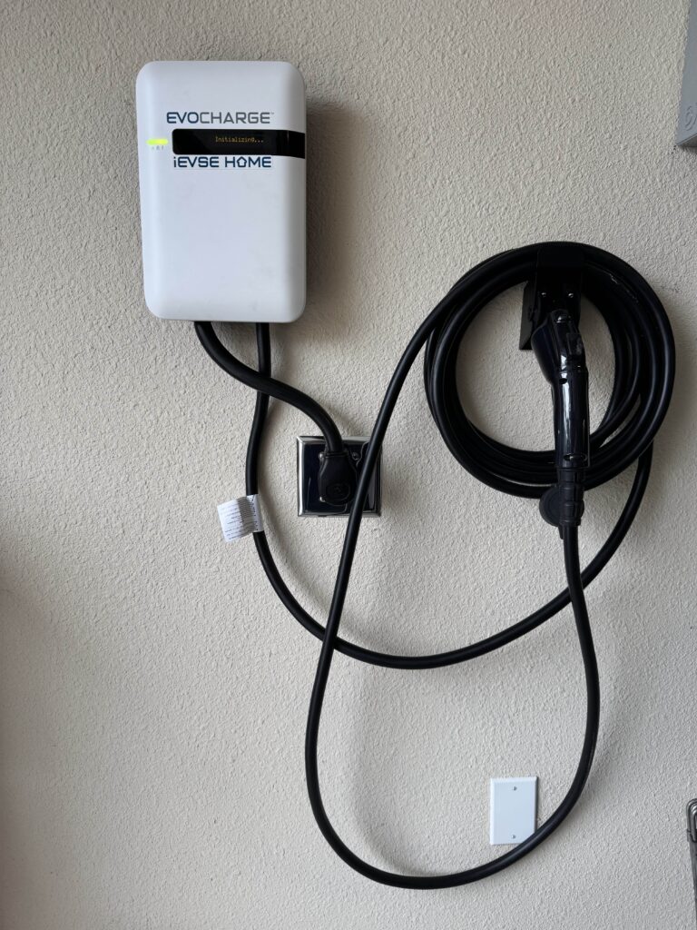 Wall-mounted EvoCharge electric vehicle charger