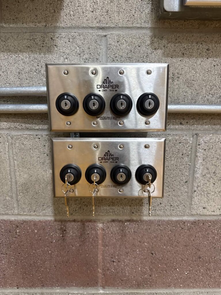 Wall-mounted keyed equipment controls